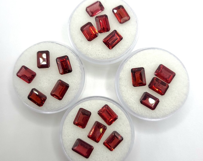 Natural Almandite garnet 19 piece set. Red garnet lot, emerald cut, 7x5mm, 27ct total, 1.42ct per est. Genuine garnet, loose gemstones lot