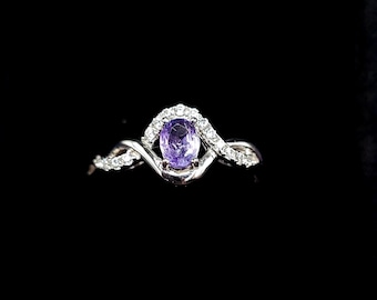 Natural tanzanite and sterling silver ring. CZ accents, size 8us, purple tanzanite ring, silver statement ring, purple ring multi stone ring