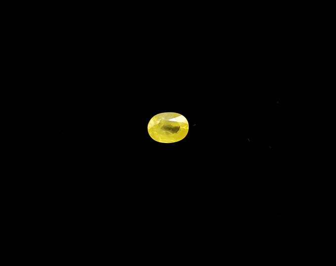 Natural sapphire oval cut loose gemstone. 1.75ct, 7.7x5.8mm, internal inclusions, neon yellow sapphire, oval cut sapphire genuine sapphire