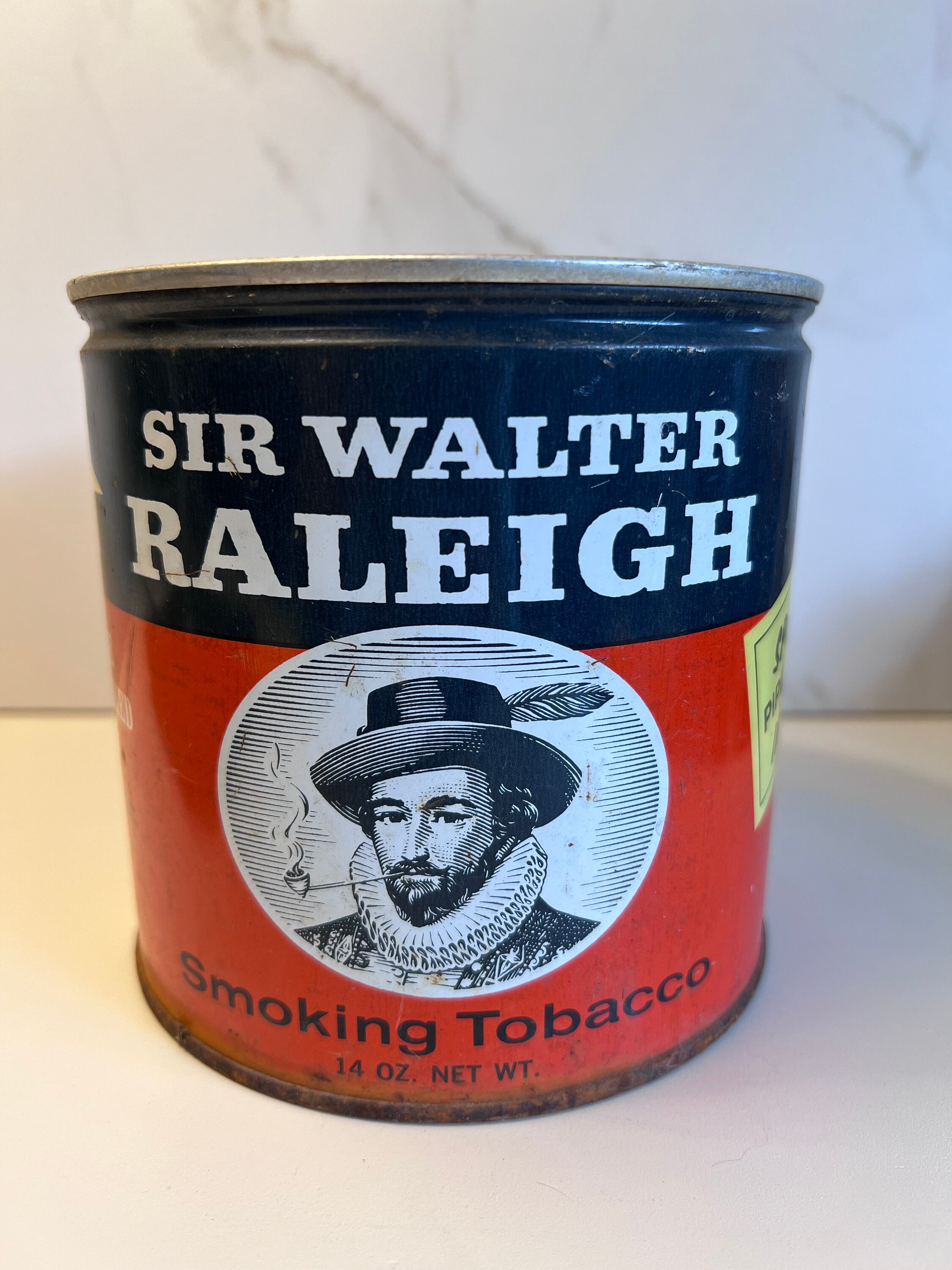 sir walter raleigh tobacco 14 oz Vintage Advertising Tin | Can, No Lid — Illustration | Orange & Blue Sir Walter Raleigh Pipe Tobacco
