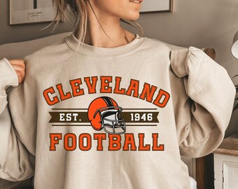 クリーブランド フットボール スウェットシャツ、クリーブランド フットボール シャツ、クリーブランド ファン クルーネック シャツ、クリーブランド スポーツ アパレル、クリーブランド ファンへのギフト