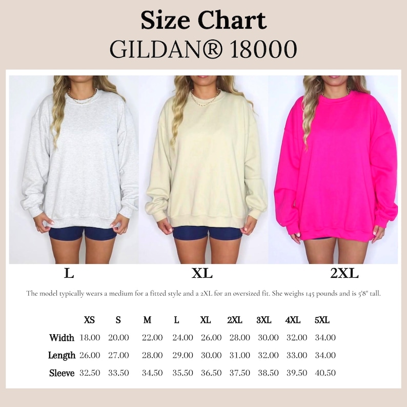 May include: Size chart for Gildan 18000 sweatshirts. The image shows three sweatshirts in light gray, beige, and hot pink. The chart lists measurements for XS to 5XL sizes, including width, length, and sleeve length in inches. The model typically wears a medium for a fitted style.