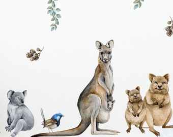 May include: A set of watercolor-style wall decals featuring Australian animals, including a koala, kangaroo, echidna, and birds. The decals are perfect for adding a touch of nature to any room.