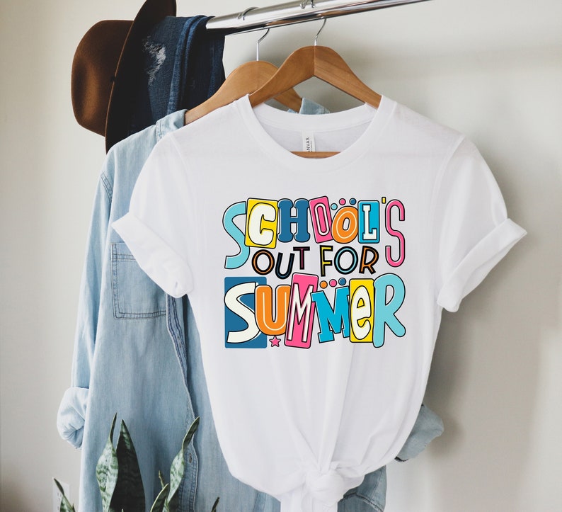 May include: White t-shirt with a colorful graphic that says "School's Out For Summer".