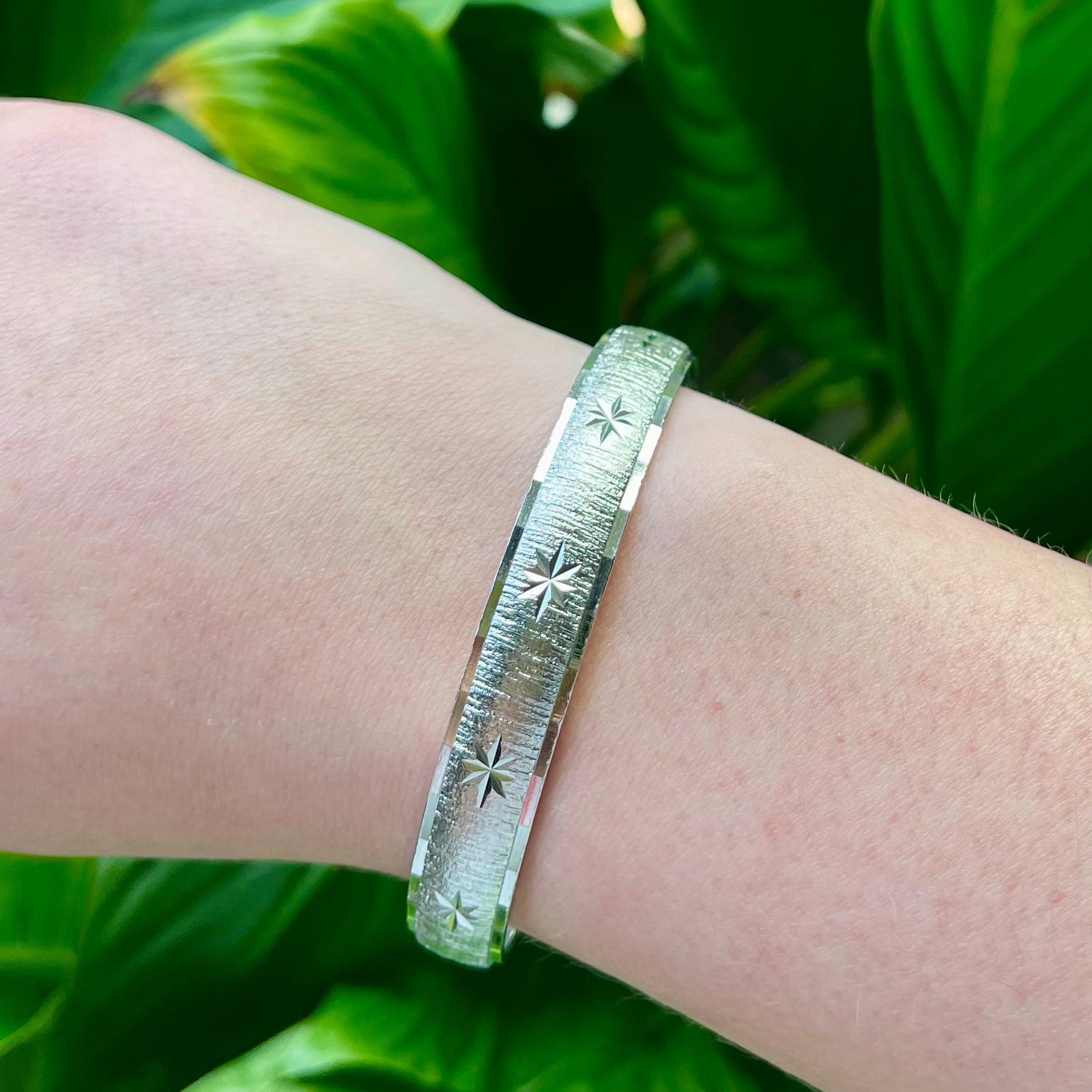 Vintage Monet Brushed Silver Tone Bangle Bracelet with Starburst Etched Design
