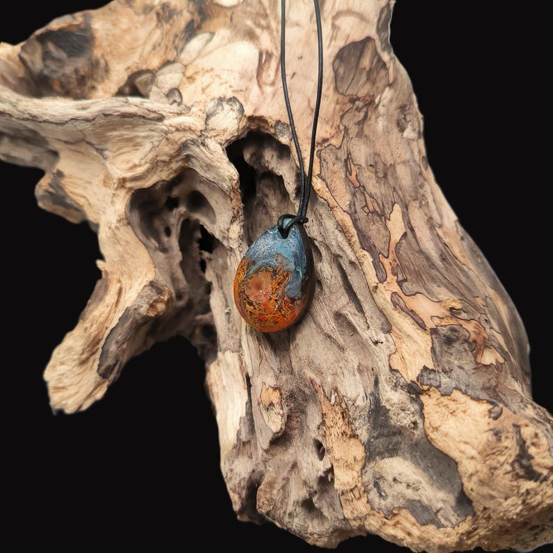 Handmade Pendant Made of Dark Wood With Epoxy Resin and Colored Storm