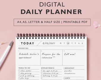 May include: A digital daily planner with a spiral binding, featuring sections for priorities, tasks, and appointments. The planner includes the text "DIGITAL DAILY PLANNER" and "A4, A5, LETTER & HALF SIZE | PRINTABLE PDF". A pen and flowers are on a pink background.
