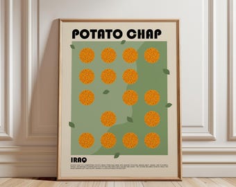May include: A framed wall art print featuring the text POTATO CHAP at the top and IRAQ at the bottom. The center displays a grid of orange textured circles on a sage green background with small green leaves scattered around the design.