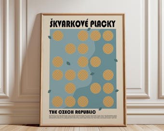 May include: A framed poster with a cream background featuring the text "ŠKVARKOVÉ PLACKY" at the top and "THE CZECH REPUBLIC" at the bottom. The center displays a blue rectangle with a grid of golden-brown circular patterns and small leaves.
