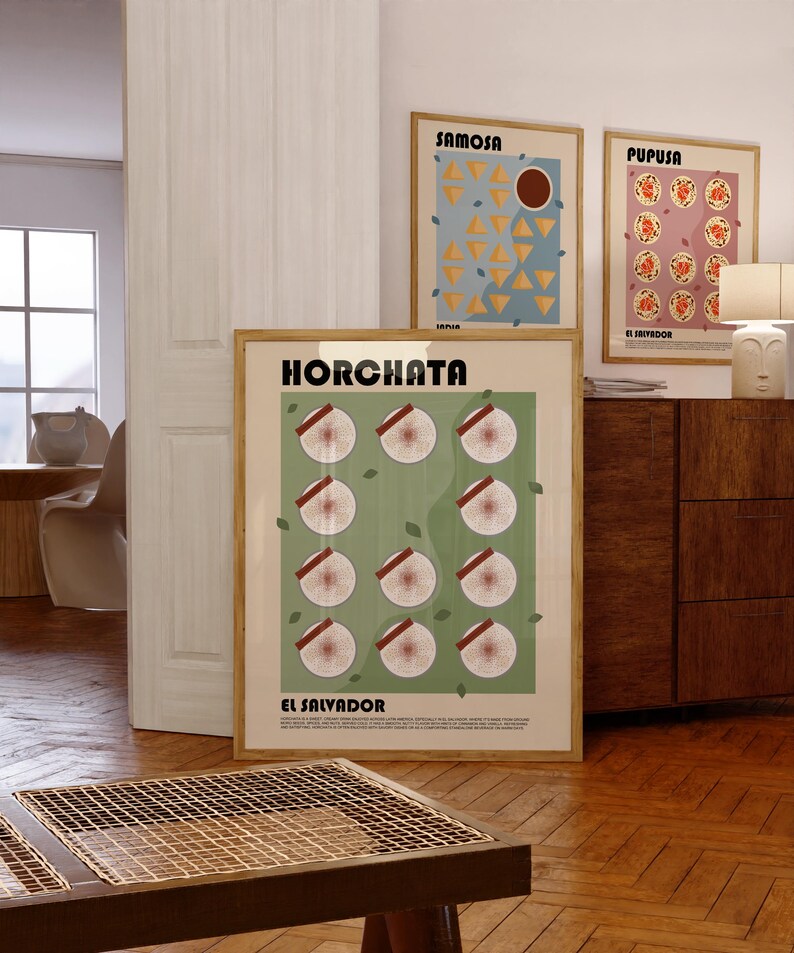 May include: A framed wall art print titled HORCHATA EL SALVADOR featuring a grid of twelve circular illustrations of horchata drinks with cinnamon sticks on a sage green background, with small text at the bottom and a light wood frame.