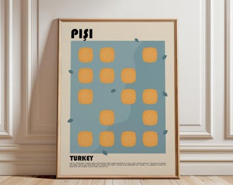 May include: A framed wall art print featuring the word PIŞI at the top and TURKEY at the bottom. The center displays a blue rectangle with twelve golden-brown square shapes arranged in a grid, accented by small dark blue leaf-like shapes.