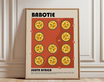 May include: A framed wall art print featuring the text BABOTIE and SOUTH AFRICA in black, with a central red rectangular graphic containing eleven circular illustrations of yellow baked dishes topped with green leaves, set against a cream background.