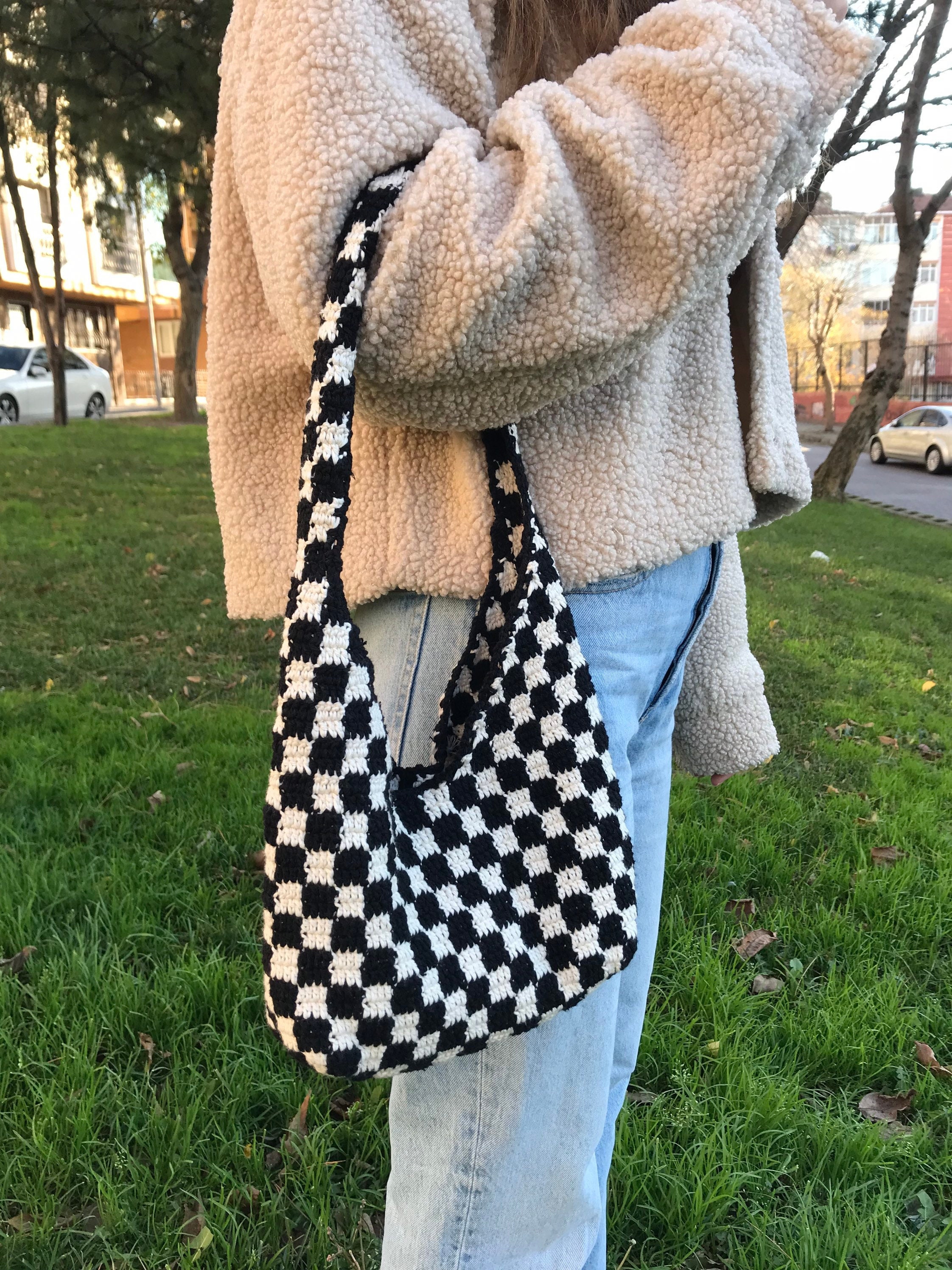 grey and white checkered purse