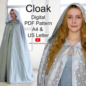 May include: A silver cloak with a hood, featuring a floral pattern, is displayed. The image includes the text "Cloak Digital PDF Pattern A4 & US Letter" and a YouTube logo. The cloak is shown on a person.