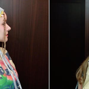 May include: A light silver cap with a rainbow accent and ties, worn with a light yellow shirt featuring a green graphic. The cap has a soft, velvety texture. The shirt has a colorful graphic design. The overall look is artistic and unique.