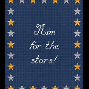 May include: A navy blue cross-stitch design with the words "Aim for the stars!" in white. The design is framed by alternating gold and silver stars.