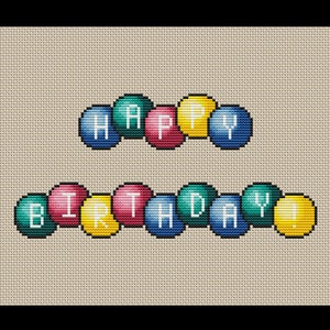 May include: A cross-stitch design on a beige background. The words "HAPPY BIRTHDAY!" are stitched in colorful, bubble-like letters. The letters are in shades of blue, pink, yellow, and green.