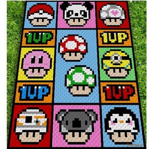 May include: A crochet blanket with a grid of 12 squares, each featuring a different cartoon character in a mushroom. The characters include a penguin, a koala, a minion, a star wars character, a green mushroom, a red mushroom, a pink mushroom, a mushroom with a heart, a mushroom with a 1UP, and a mushroom with a panda face.