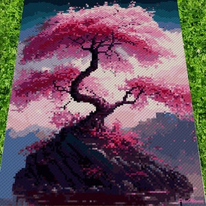 May include: A pixel art image of a pink cherry blossom tree growing out of a rocky outcrop. The tree has a dark brown trunk and branches, and the leaves are a vibrant pink. The background is a soft blue and pink.