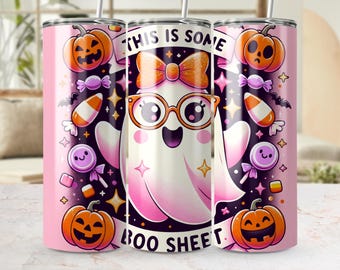 May include: A pink Halloween-themed tumbler featuring a cartoon ghost wearing glasses and a bow, surrounded by pumpkins, candy, and the text "THIS IS SOME BOO SHEET."