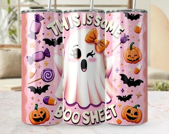 May include: A pink Halloween-themed tumbler with a cute ghost illustration, candy, bats, and pumpkins. The text "THIS IS SOME BOO SHEET" is displayed on the tumbler. The tumbler has a straw and a pink background.