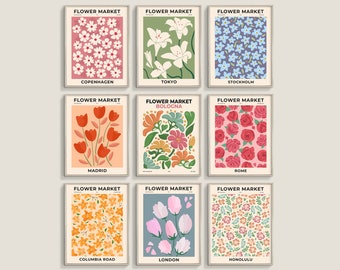 May include: Nine colorful posters with floral patterns and the text "Flower Market" above each pattern. Each poster also includes the name of a city below the pattern. The cities are Copenhagen, Tokyo, Stockholm, Madrid, Bologna, Rome, Columbia Road, London, and Honolulu.