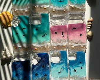 Ocean wave design custom iPhone and Samsung phone cases. Sharks, sea turtles and manta rays. Clear phone cases with blue beach waves.