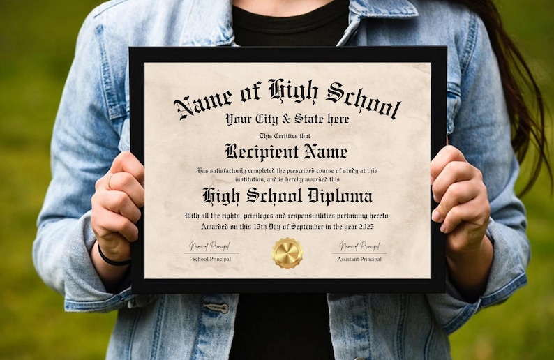 May include: A black framed diploma certificate with a gold seal. The text reads "Name of High School", "Your City & State here", "Recipient Name", "High School Diploma", "Awarded on this 15th Day of September in the year 2025", "School Principal", and "Assistant Principal".