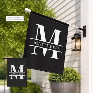 May include: Black personalized monogram flag with the name "Matthews" in white. The flag features a large white "M" and is displayed outdoors. A smaller version of the flag is also shown. The text "PERSONALIZED MONOGRAM FLAG" is in the upper left corner.