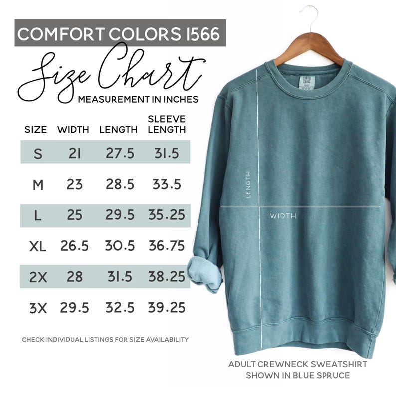 May include: Blue spruce adult crewneck sweatshirt on a wooden hanger. The image includes a size chart with measurements in inches for width, length, and sleeve length. The chart shows sizes S to 3X.