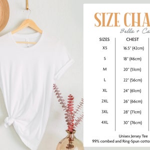 May include: Size chart for Bella + Canvas 3001 unisex jersey tee. The chart shows sizes XS to 4XL with corresponding chest and length measurements in inches and centimetres.