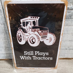 Still Plays With Tractors Tin Sign