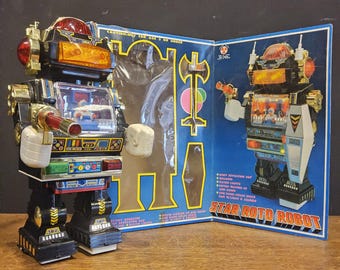 Working retro Star Roto Robot by Son Plastic Industrial Company AI Toys (1985) in box (gives lights, shoots, robot walks, guy go up and down