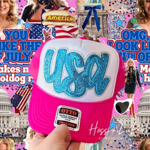 May include: A pink trucker hat with a white front panel and the word "USA" in blue sequined letters. The hat has a curved brim and a mesh back. The hat also has a tag that says "OTTO" and "TRUCKER".