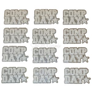 May include: Nine silver sequined patches with the words "COMP DAY" in a block letter font, each accompanied by a star. The patches are arranged in three rows of three.