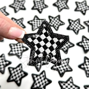 May include: Black and white checkered star-shaped iron-on patch with sequins. The patch is approximately 2 inches in diameter.