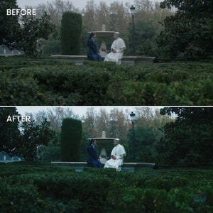May include: Two people, a woman in a dark blue dress and a man in a white robe, are sitting on a stone bench in a garden setting. The woman is looking down, while the man is looking at the woman. There is a fountain behind them.