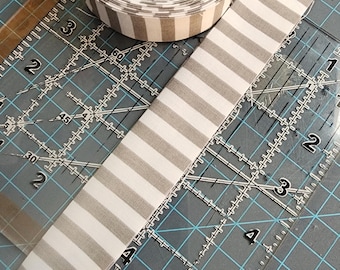 Grey 2 1/2 inch pressed striped binding for quilts and projects by the yard