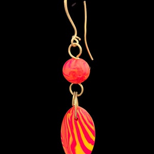 Psychedelic yellow orange red spiral earrings