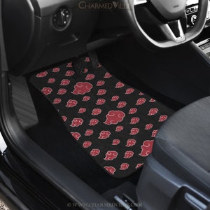 May include: Black car floor mats with a red cloud pattern. The mats are made of a soft, durable material and are designed to protect your car's interior from dirt, spills, and wear and tear.