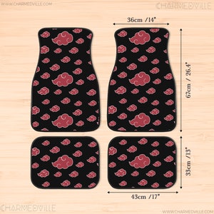 May include: Set of four car floor mats with a black background and a repeating pattern of red clouds. The mats are 17 inches by 13 inches and 14 inches by 26.4 inches.