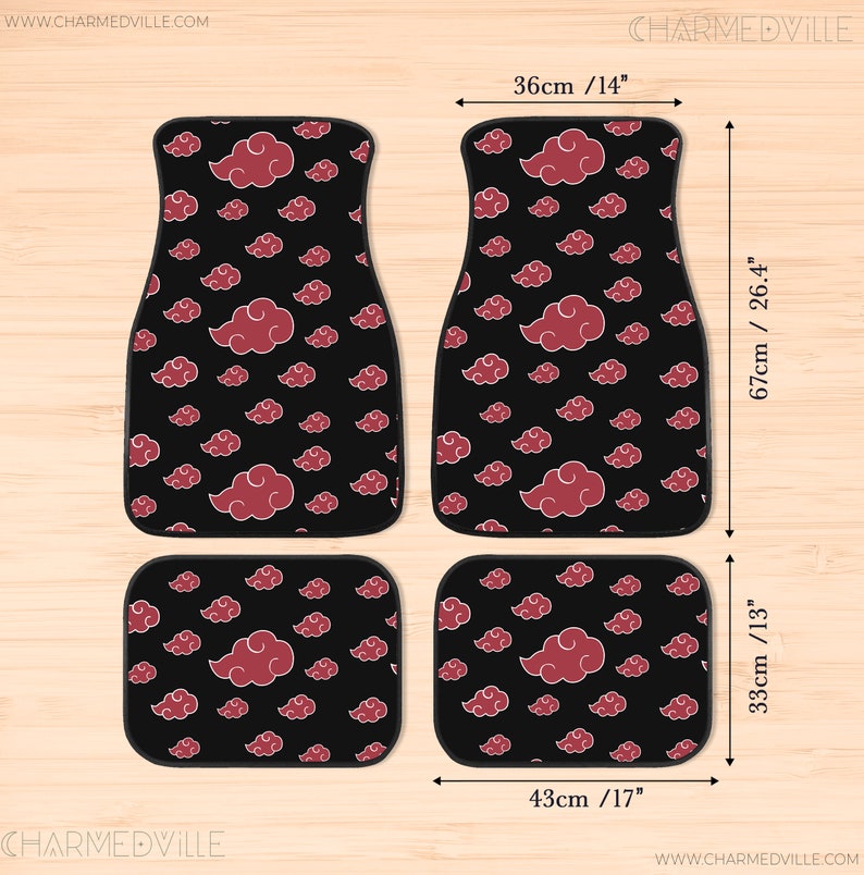 May include: Set of four car floor mats with a black background and a repeating pattern of red clouds. The mats are 17 inches by 13 inches and 14 inches by 26.4 inches.