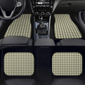 May include: A set of four car floor mats featuring a sage green and white gingham check pattern. The mats are installed in the front and rear footwells of a vehicle interior, covering the floor area with a consistent checkered design.