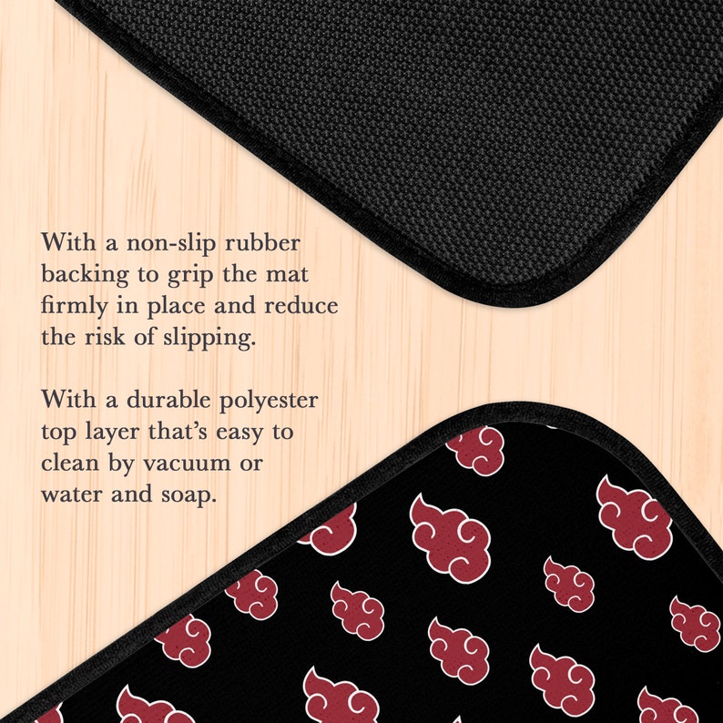 May include: Black and red floor mat with a repeating pattern of red clouds. The mat has a non-slip rubber backing and a durable polyester top layer.
