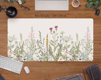 Può includere: Un tappetino da scrivania bianco con un design floreale con fiori rosa, viola e gialli. Il tappetino misura 40 x 20 pollici o 100 x 50 cm.