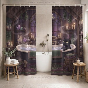 May include: A whimsical shower curtain featuring a black cat in a bathtub, surrounded by candles, crystals, and apothecary bottles. The design has a purple and brown color scheme, with a gothic and witchy theme. The text "www.charmedville.com" is visible.