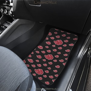 May include: Black car floor mat with a red cloud pattern. The mat is made of a soft, plush material and is designed to protect your car's interior from dirt and wear.
