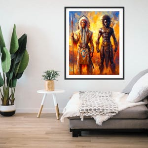 Framed colorful painting of a Native American warrior and an African warrior hanging on a white wall above a gray sofa, beside a small side table and a tall potted plant.