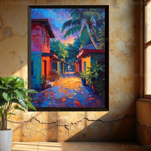 Pu&ograve; includere: Un dipinto vibrante raffigura una scena di strada tropicale. Edifici colorati in tonalit&agrave; di rosso, arancione e blu costeggiano un sentiero acciottolato. Palme e vegetazione lussureggiante incorniciano la vista, con un cielo al tramonto sopra. L'opera &egrave; incorniciata in nero.