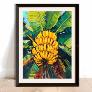 May include: A framed art print depicting a bunch of ripe yellow bananas set against large green banana leaves. The artwork is presented in a black frame. The painting style is impressionistic, with visible brushstrokes, creating a textured effect.